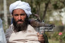 herat-afghanistan-surrendering-taliban-militants-stand-with-their-weapons-as-they-are.jpg